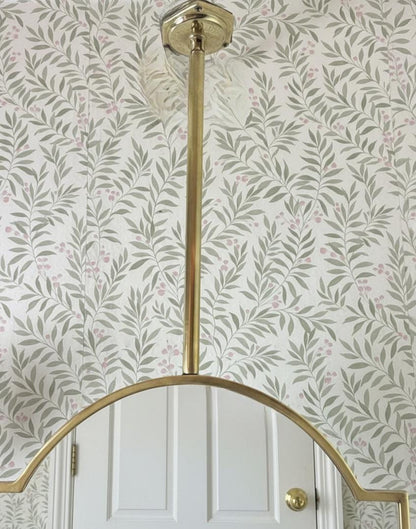 Ceiling mounted brass rod connection detail