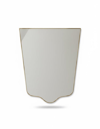 Irregular rectangular shield brass mirror in a white background.