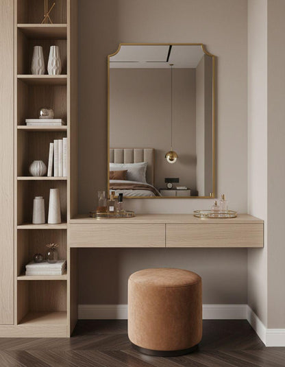 Handmade scalloped brass mirror above bedroom vanity