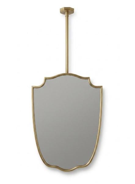 Handcrafted suspended brass mirror with elegant curved frame on a neutral background.
