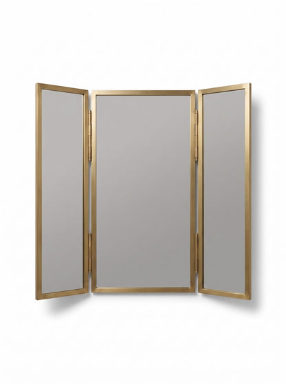 Open brass three-panel vanity mirror on white background.