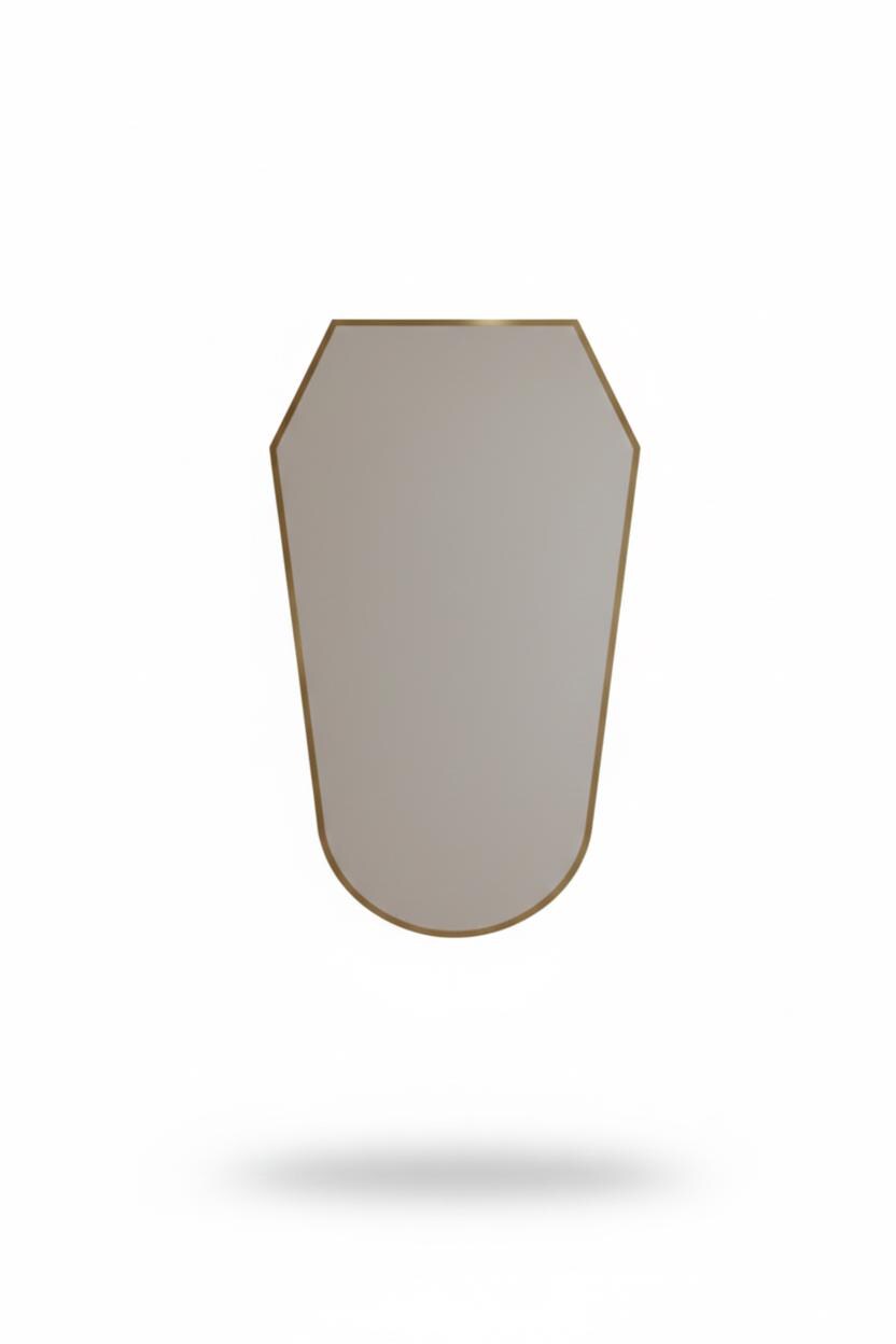 Shield brass mirror in a white background