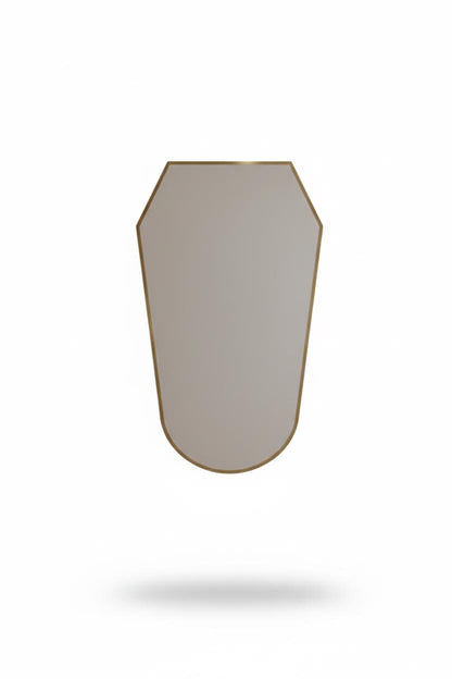 Shield brass mirror in a white background