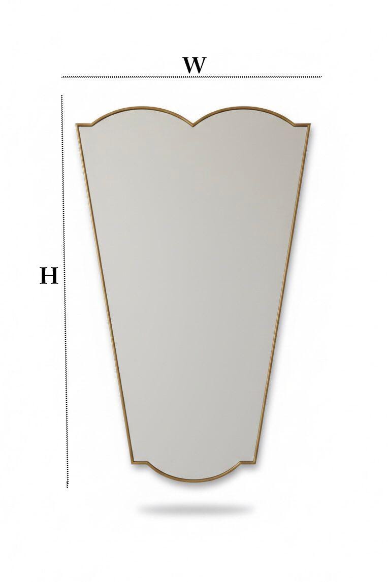Tapered brass vanity mirror with wall sconces