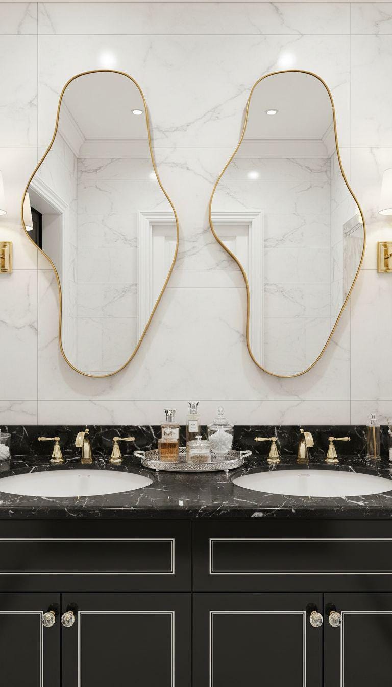 Modern organic brass mirror in minimalist vanity area