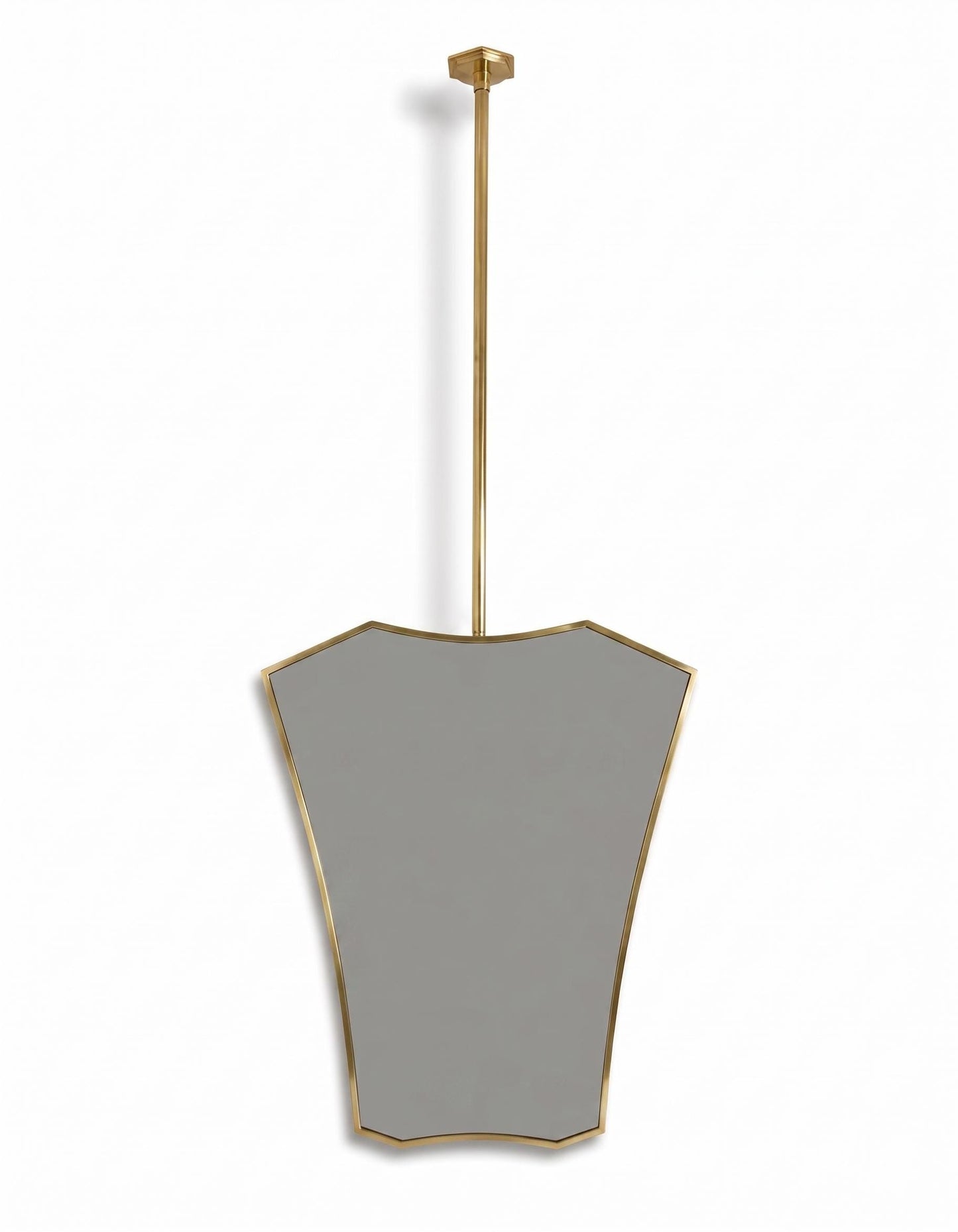 Modern hanging brass mirror on white background