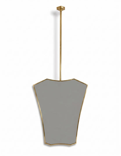 Modern hanging brass mirror on white background