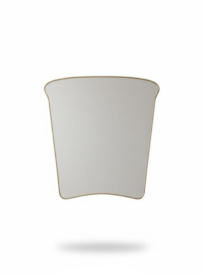 Curved square brass mirror in a white background