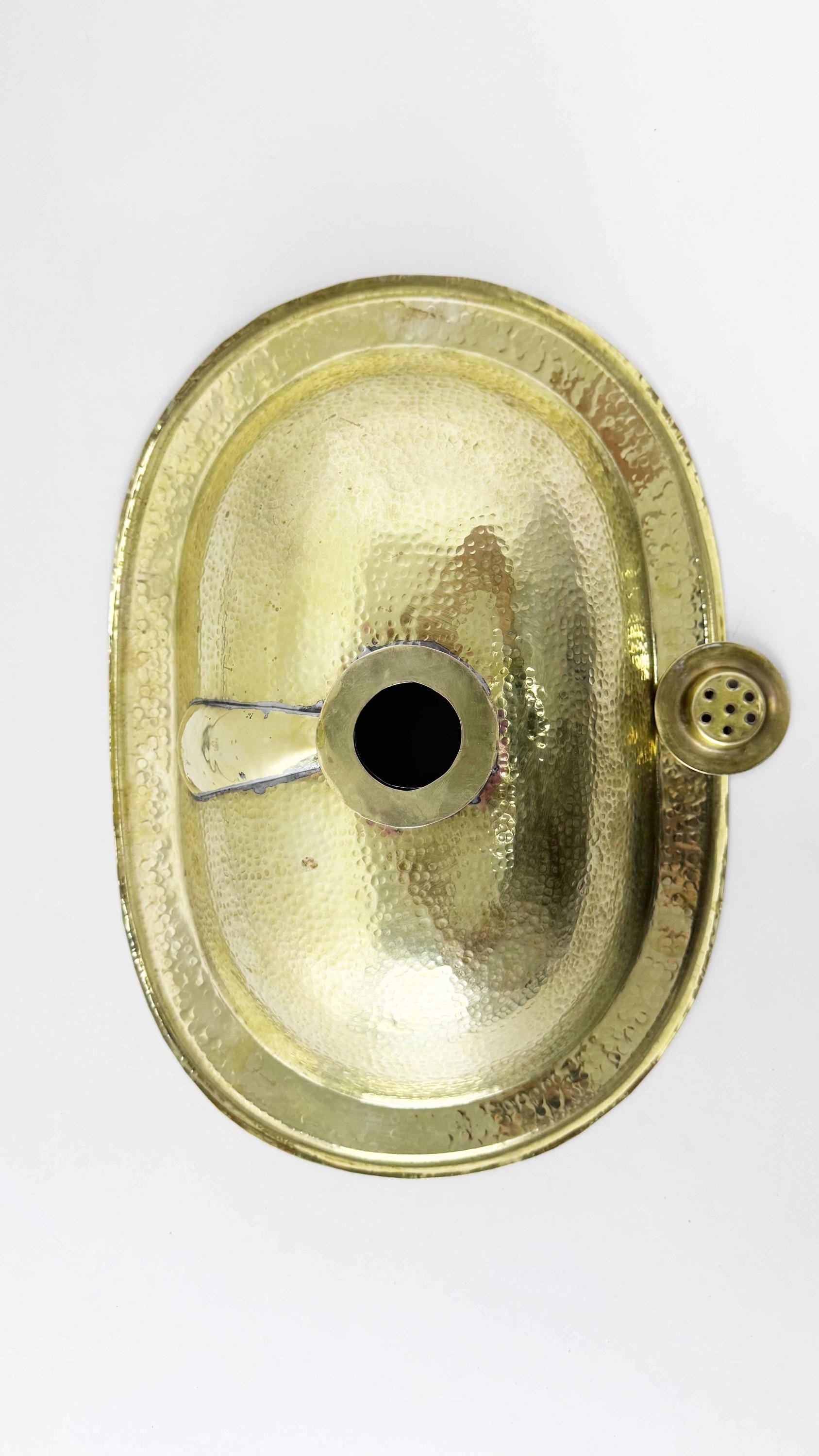 back of hammered brass bathroom sink