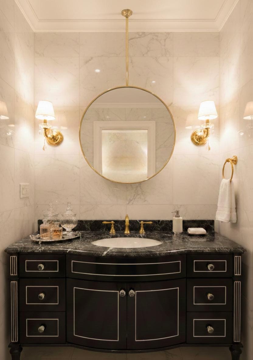 Classic bathroom vanity with round brass ceiling mirror