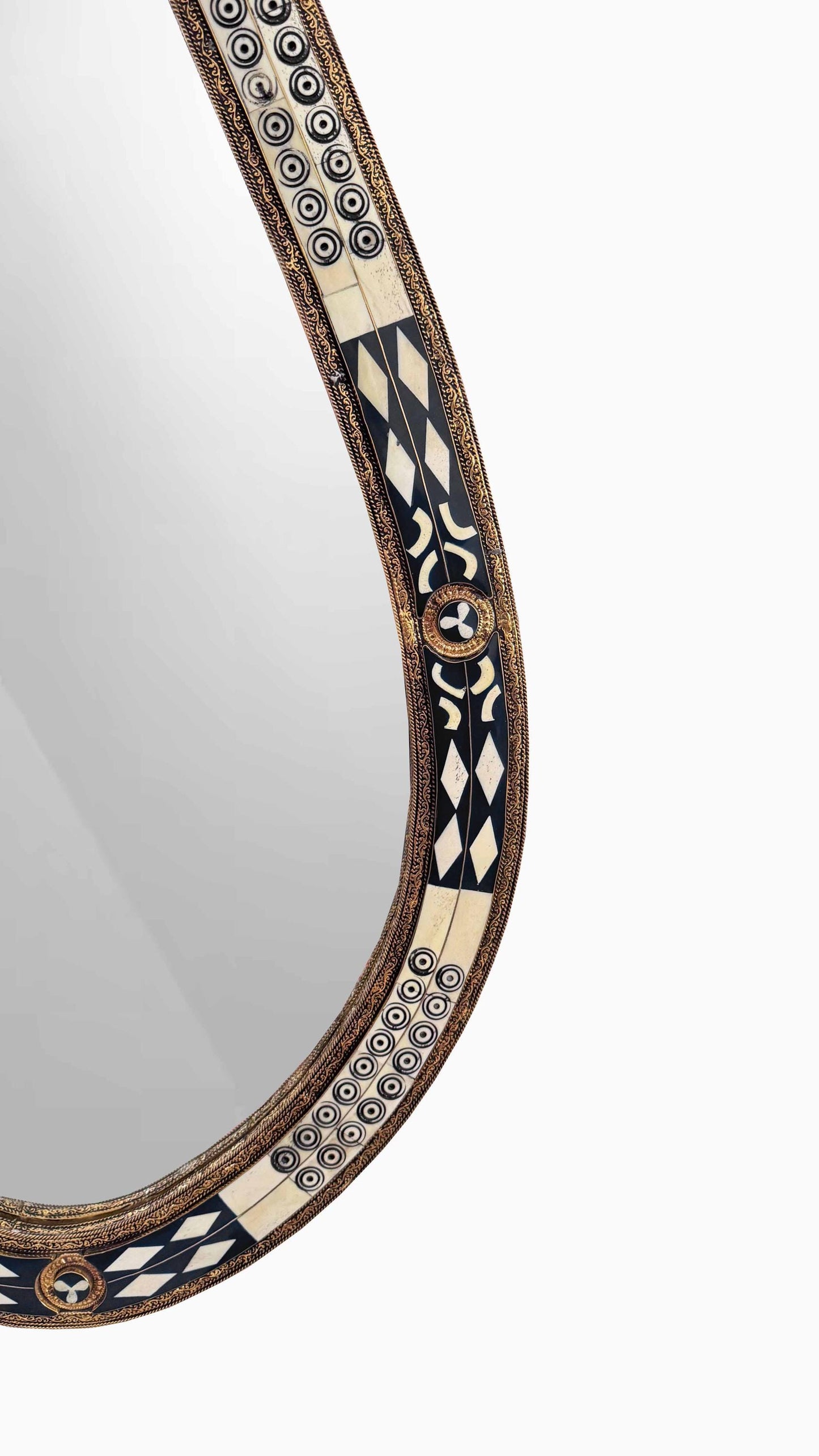 black frame bone and brass mirror