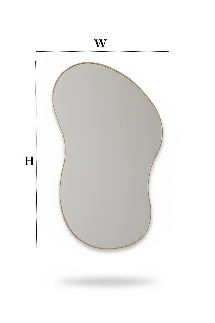 Asymmetrical curved brass mirror with organic modern silhouette