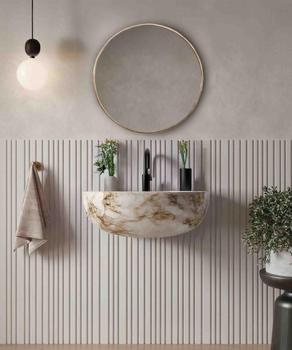 gold frame mirror in bathroom
