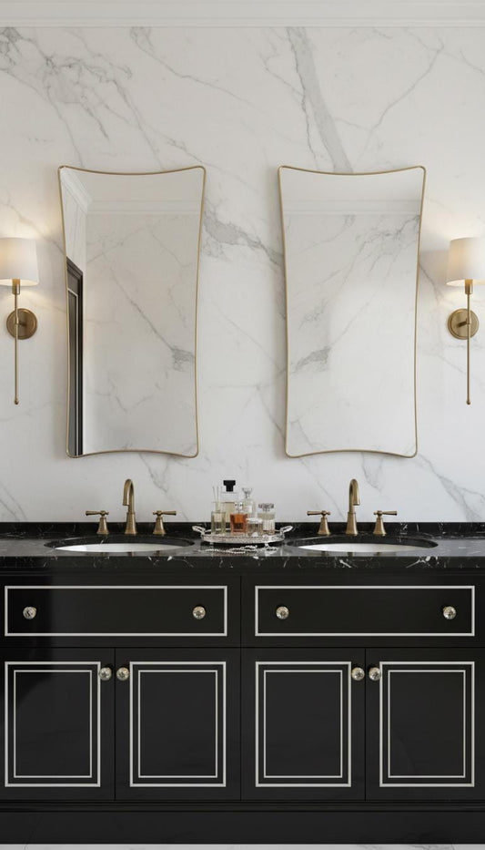 Handmade brass mirror with soft curved edges in double vanity bathroom