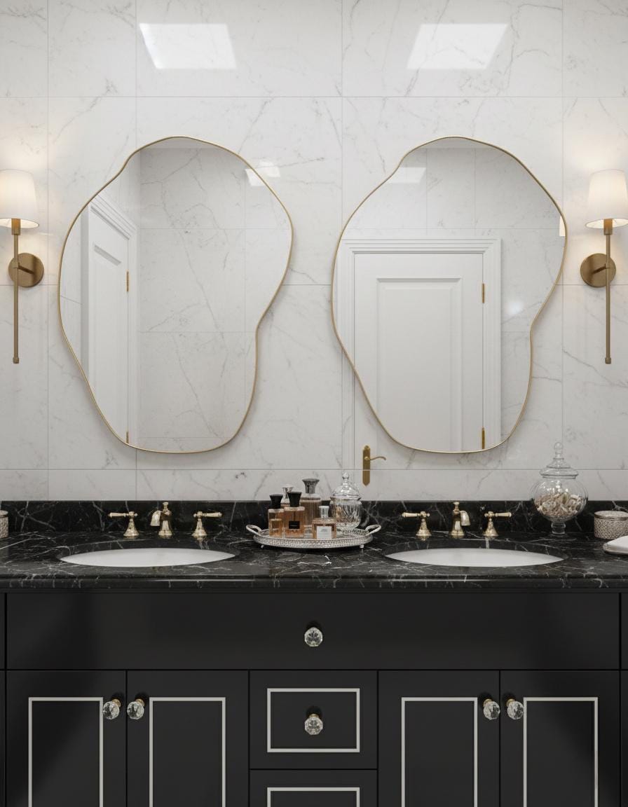 Pair of handmade irregular brass mirrors in modern double vanity bathroom